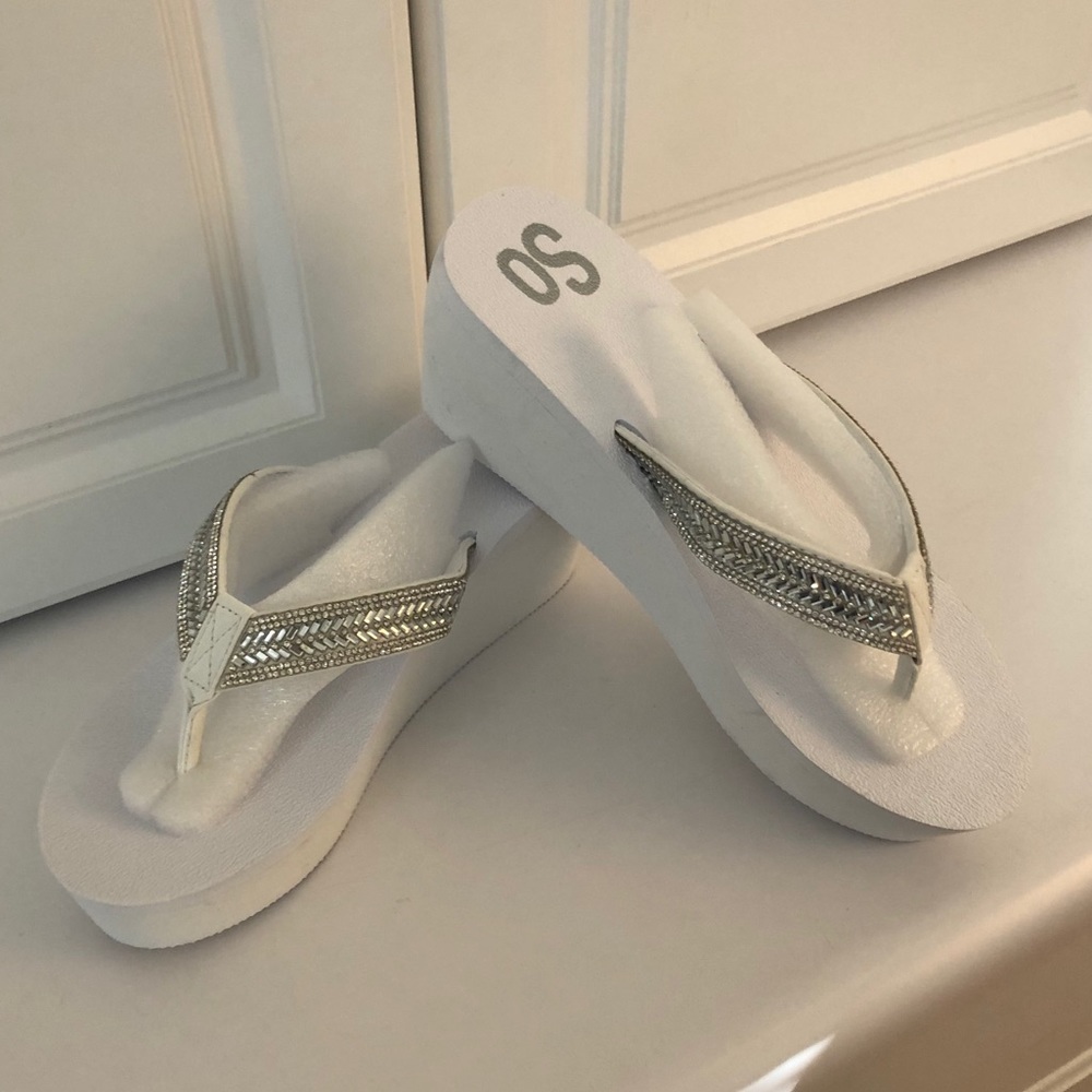 SO white wedge flip flops